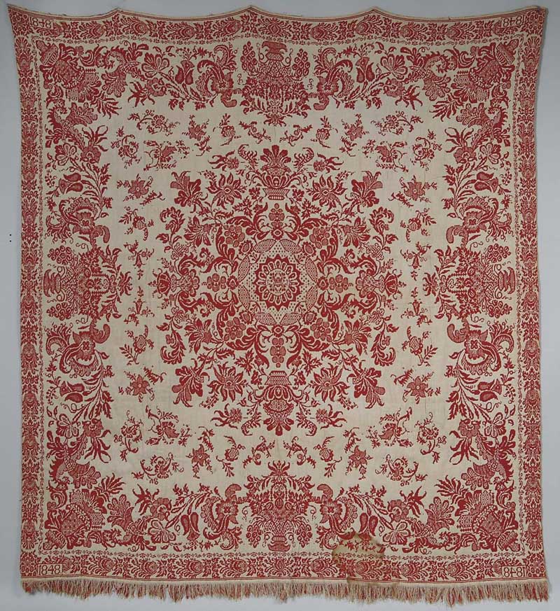 Appraisal: RED AND WHITE JACQUARD COVERLET DATED Decorated with center medallion