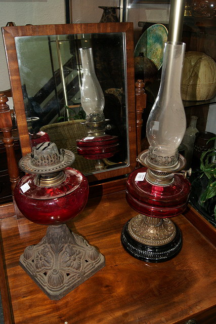 Appraisal: A VICTORIAN CRANBERRY GLASS OIL LAMP and another similar with