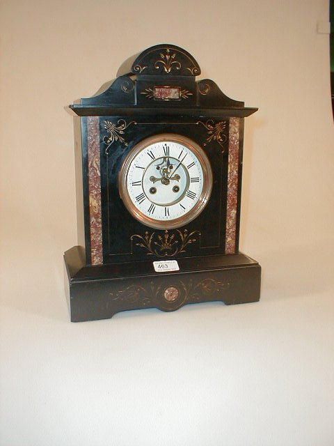 Appraisal: A thC French polished slate and marble inset mantel clock