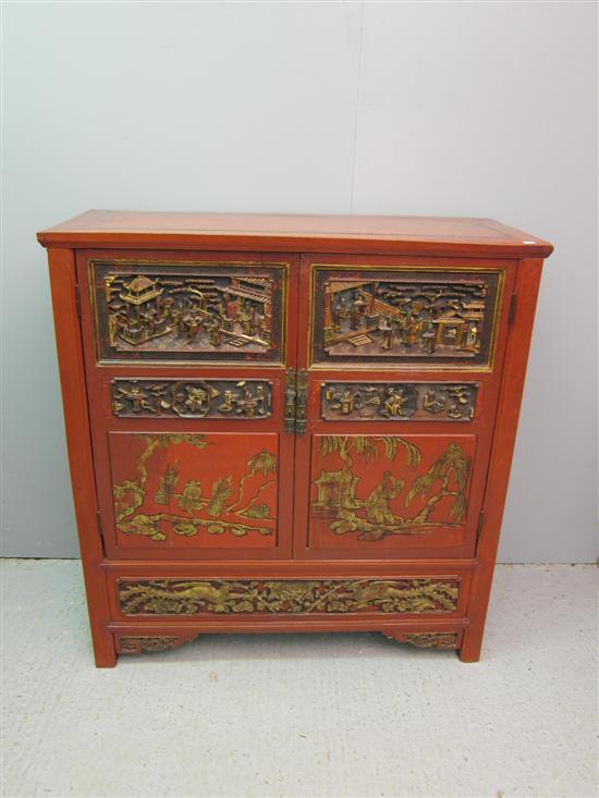 Appraisal: th century Chinese red lacquered and gilt cabinet two doors