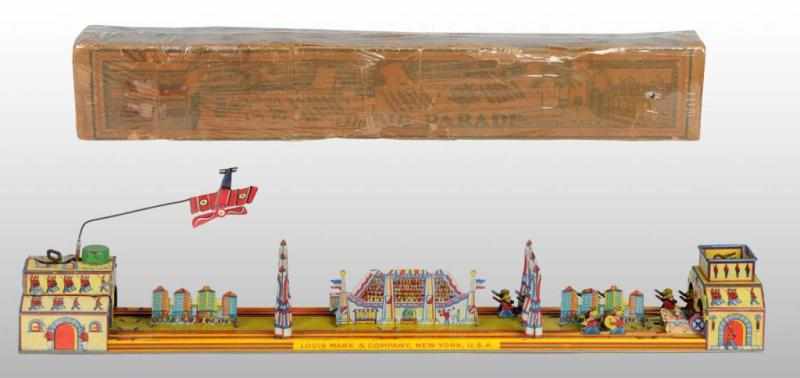 Appraisal: Tin Marx The Big Parade Wind-Up Toy Description American Working