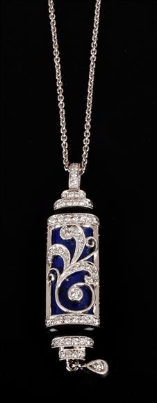 Appraisal: A lapis lazuli onyx and diamond pendant the lapis lazuli