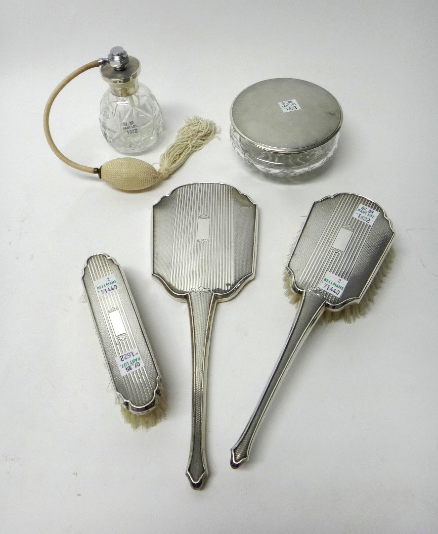 Appraisal: Ladies silver mounted dressing table wares comprising a faceted glass