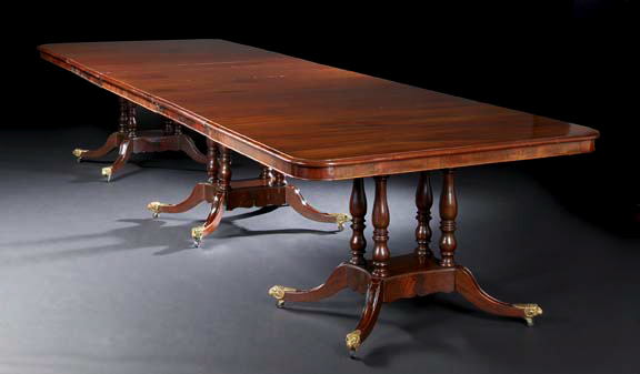 Appraisal: George III-Style Mahogany Dining Table the rounded rectangular top with