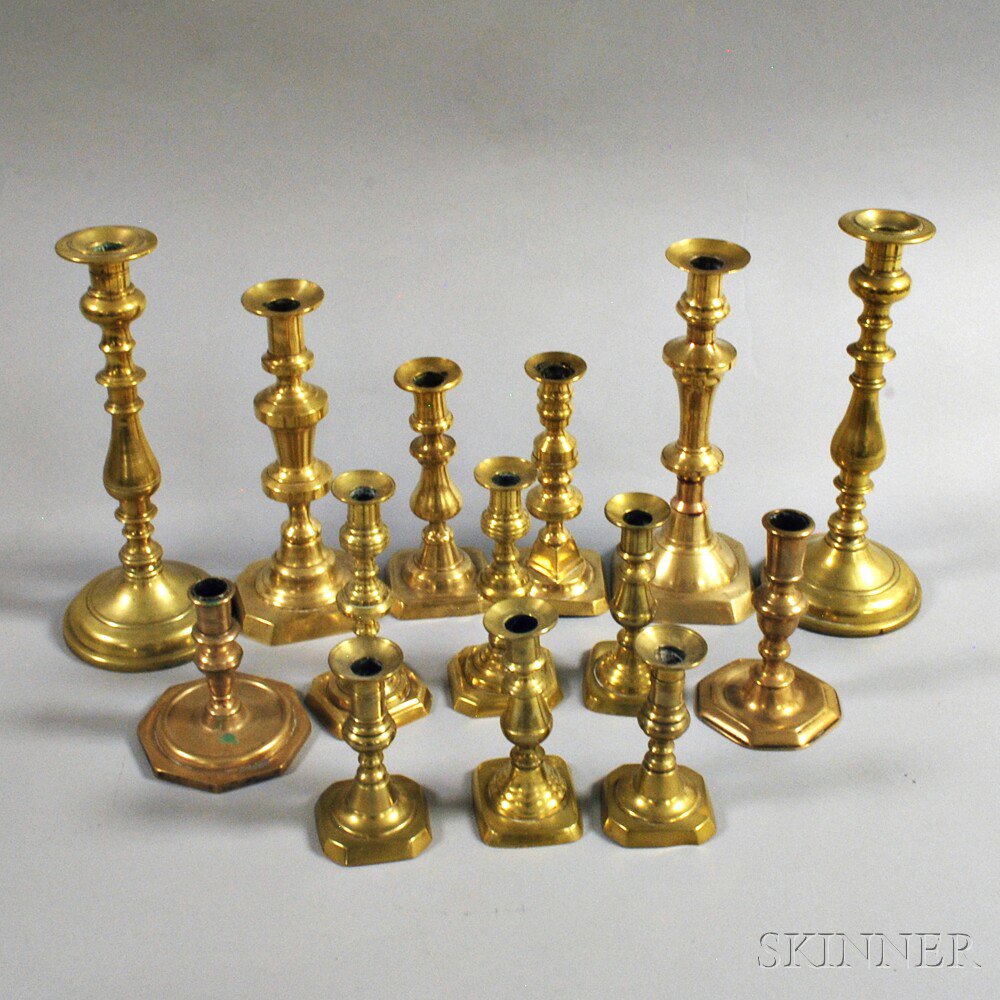 Appraisal: Fourteen Brass Candlesticks th and th century two pairs and