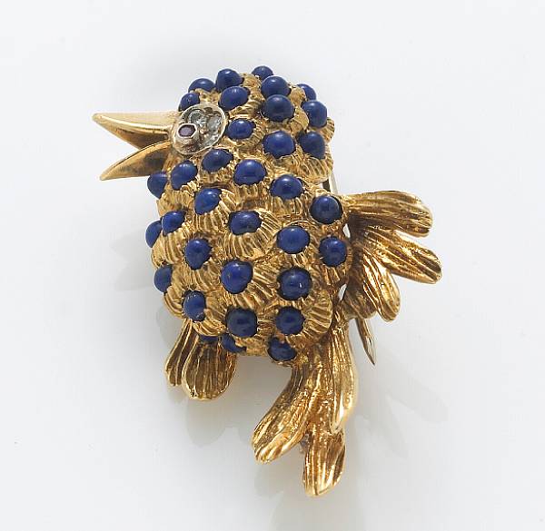 Appraisal: A lapis lazuli diamond ruby and k gold bird brooch