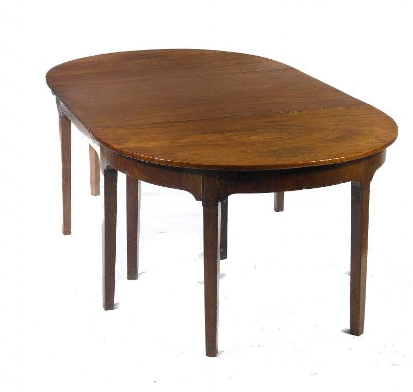 Appraisal: A GEORGE III MAHOGANY DINING TABLE the pair of semi