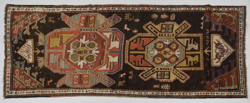 Appraisal: Semi-Antique Tribal Runner bright colors two medallions wool base the