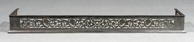 Appraisal: Pierced steel fender frieze with phoenixes flowers and scrolls British