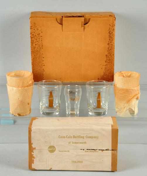 Appraisal: Boxes of Coke Glasses and Individual Glass Description Smaller box