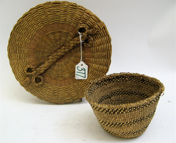 Appraisal: TWO HAND WOVEN NORTHWEST INDIAN BASKETS the first of cedar