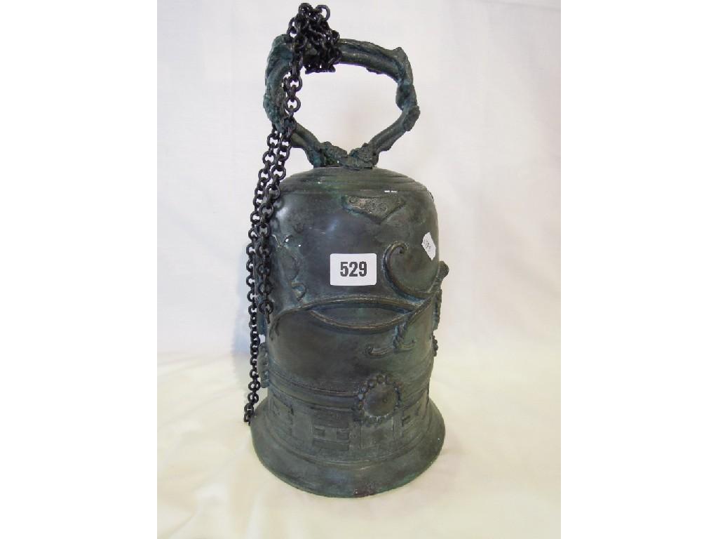 Appraisal: A bronze bell of oriental form with grape vine detail