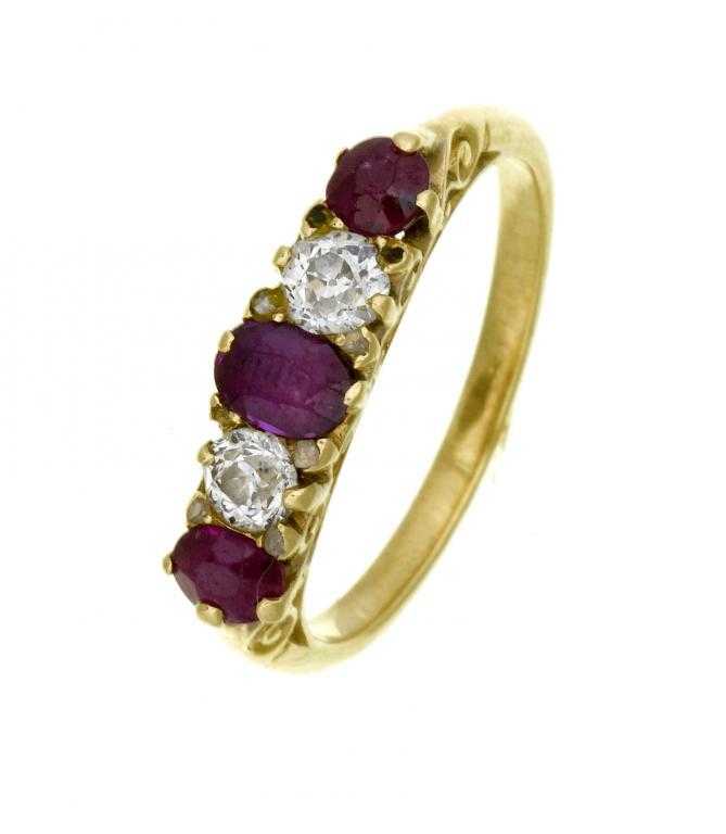 Appraisal: A RUBY AND DIAMOND FIVE STONE RING with three rubes