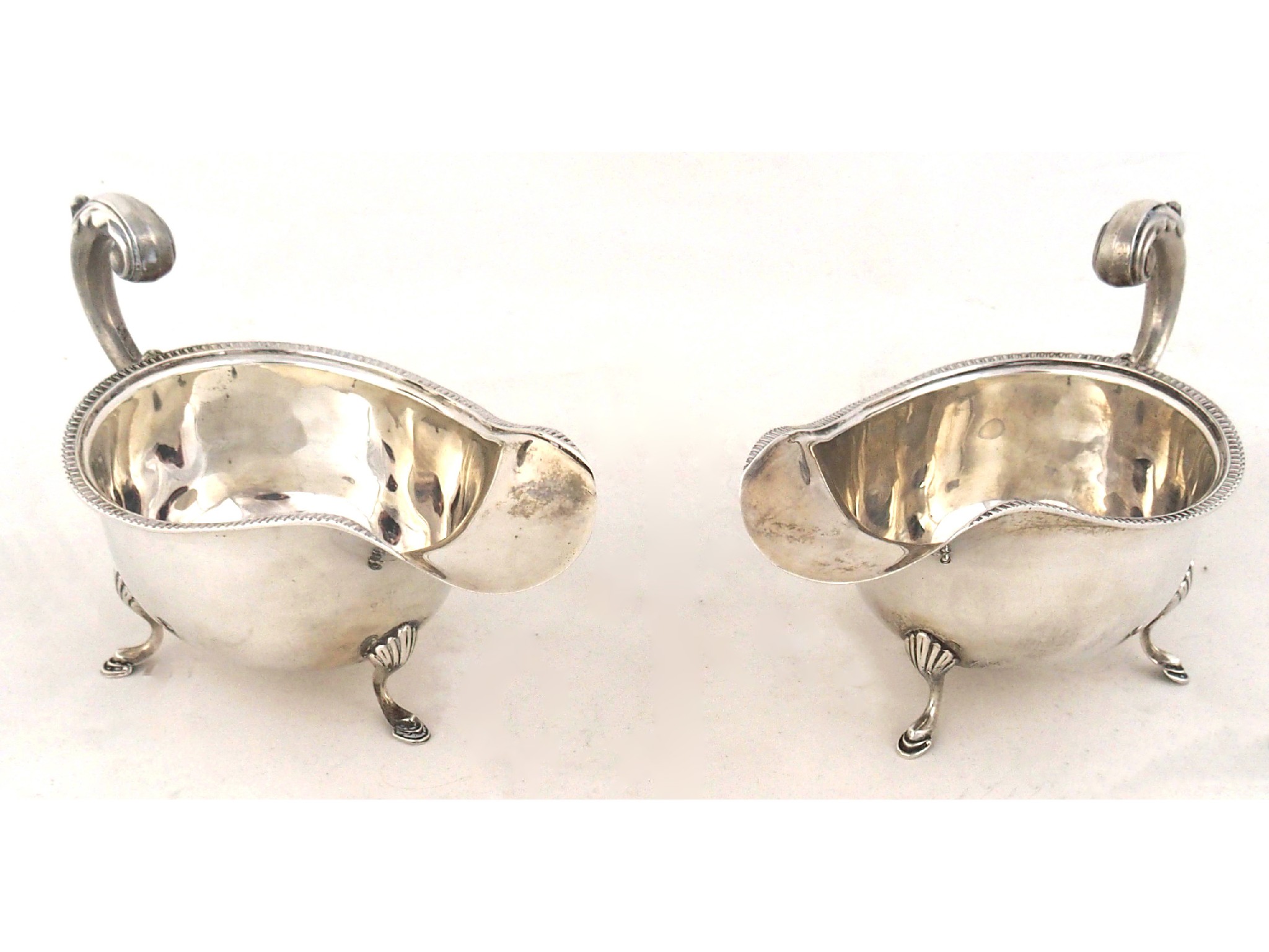 Appraisal: A pair of silver sauceboatsby S Blanckensee Sons Limited Birmingham