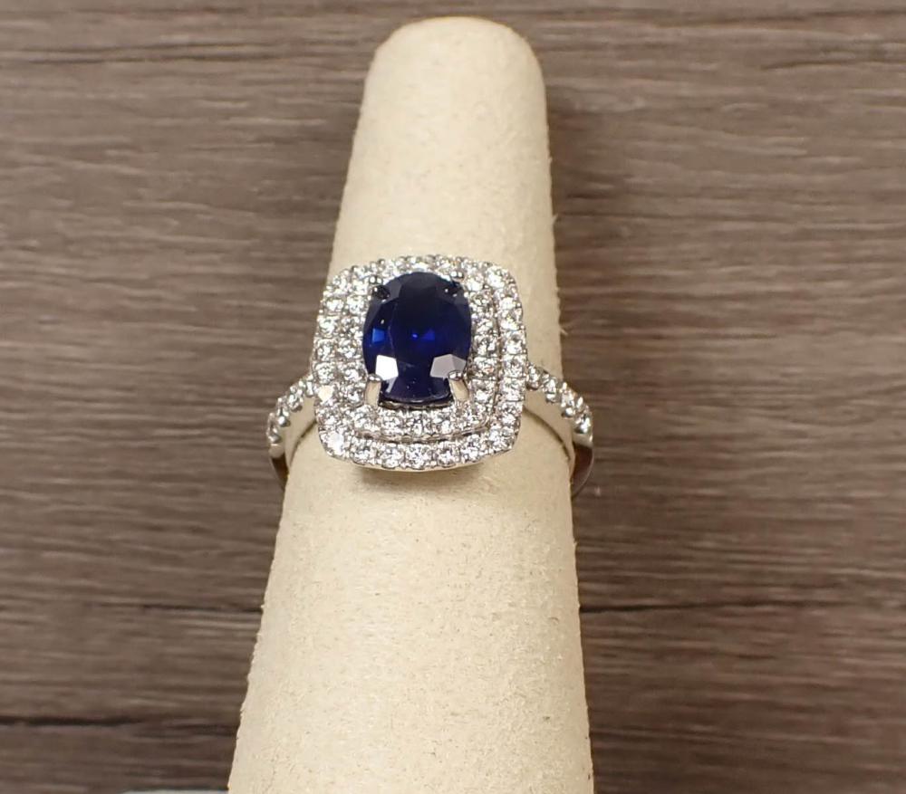 Appraisal: SAPPHIRE DIAMOND AND FOURTEEN KARAT GOLD RING The k white