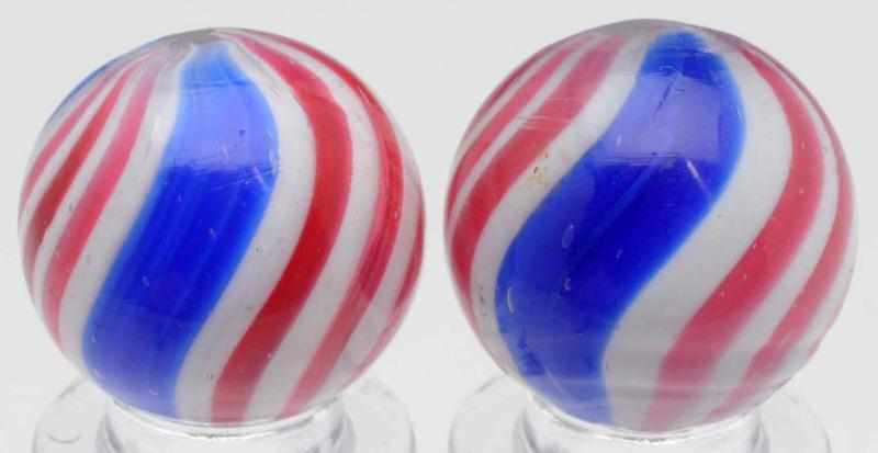 Appraisal: Lot of Peppermint Swirl Marbles Lot of two three-banded red