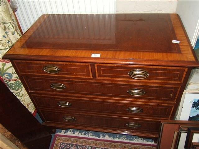 Appraisal: A reproduction mahogany satinwood inlaid chest of two short and