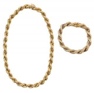 Appraisal: Two Gold Chains one necklace with textured twisting links and