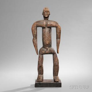 Appraisal: Vere Carved Wood Male Figure Nigeria the standing figure with