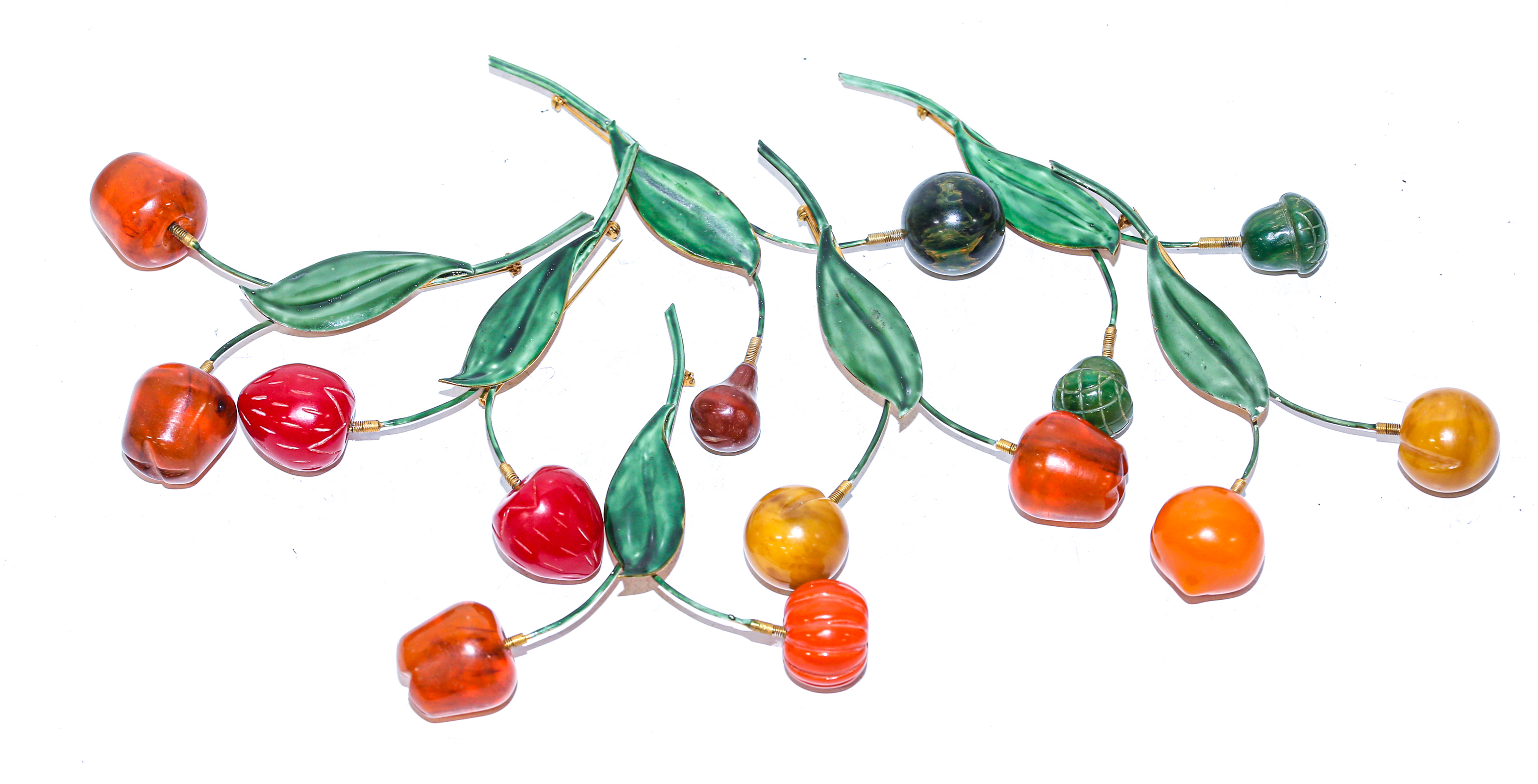 Appraisal: A COLLECTION OF FRUIT-THEMED BAKELITE BROOCHES All by Sandor Co