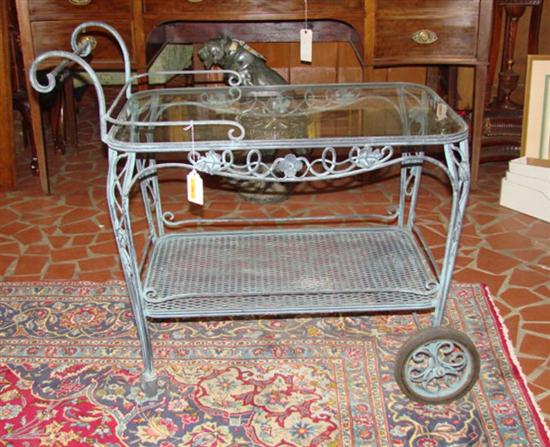 Appraisal: Wrought-iron trolley H W D