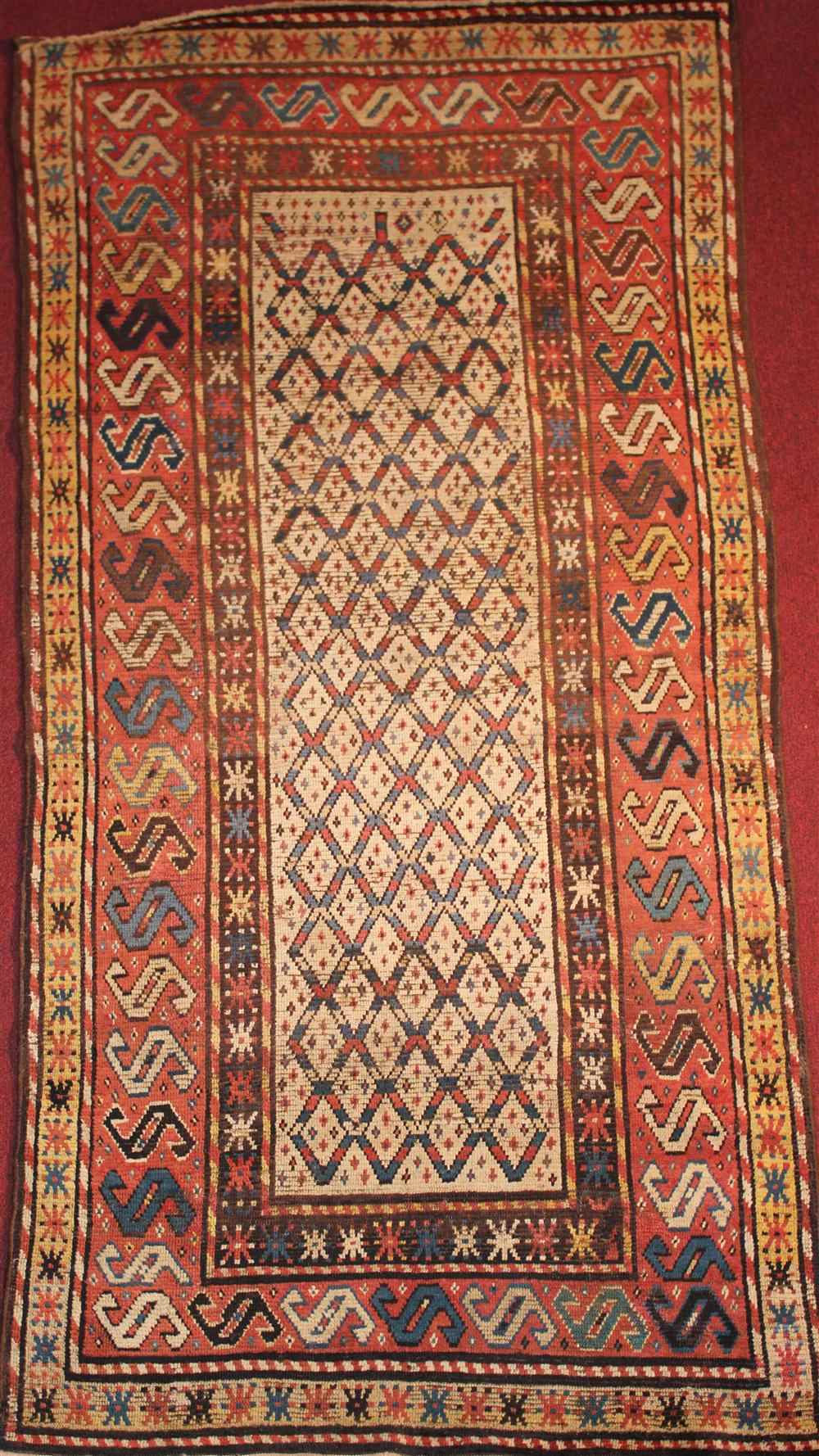 Appraisal: RUSSIAN CAUCASIAN RUG approx ' ' x ' '' retail