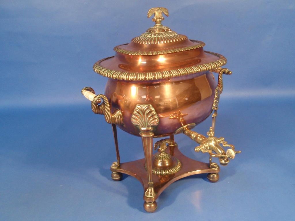 Appraisal: A thC copper samovar with turned ivory handles and stamped