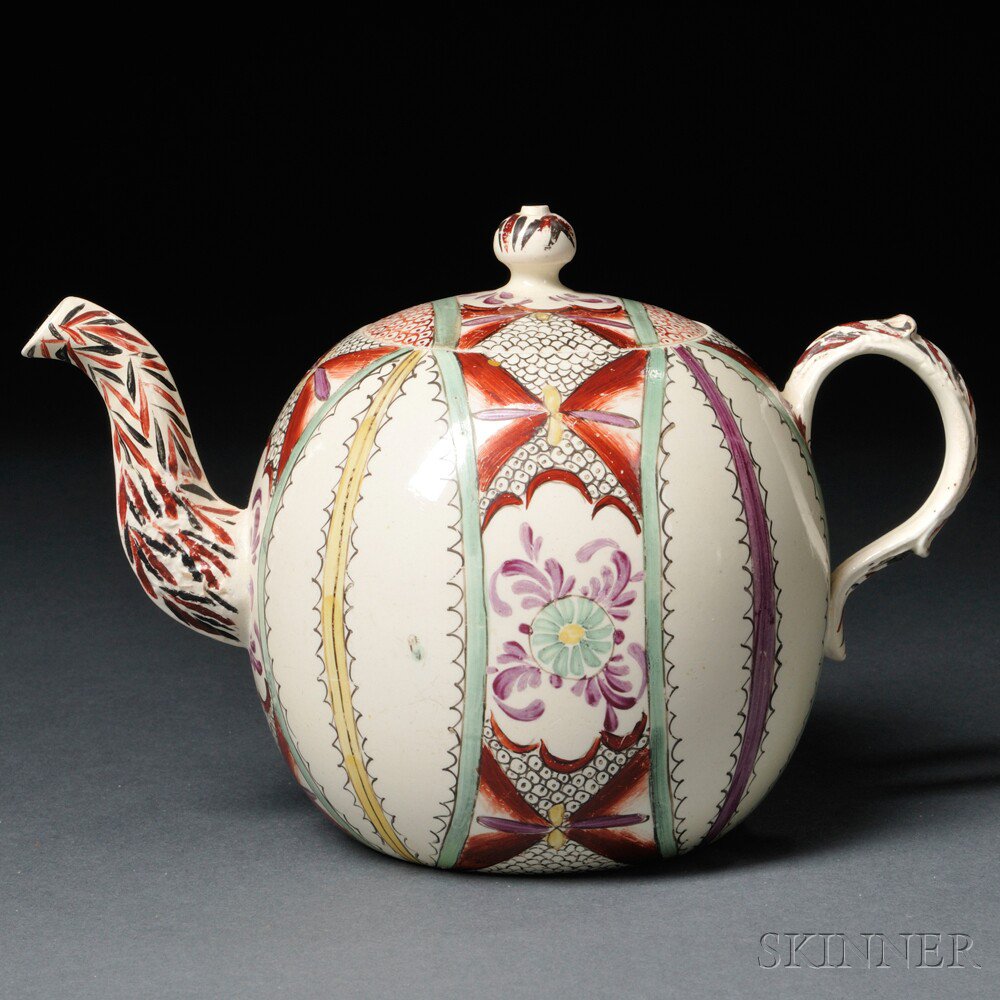 Appraisal: Staffordshire Cream-colored Earthenware Teapot and Cover England c globular with