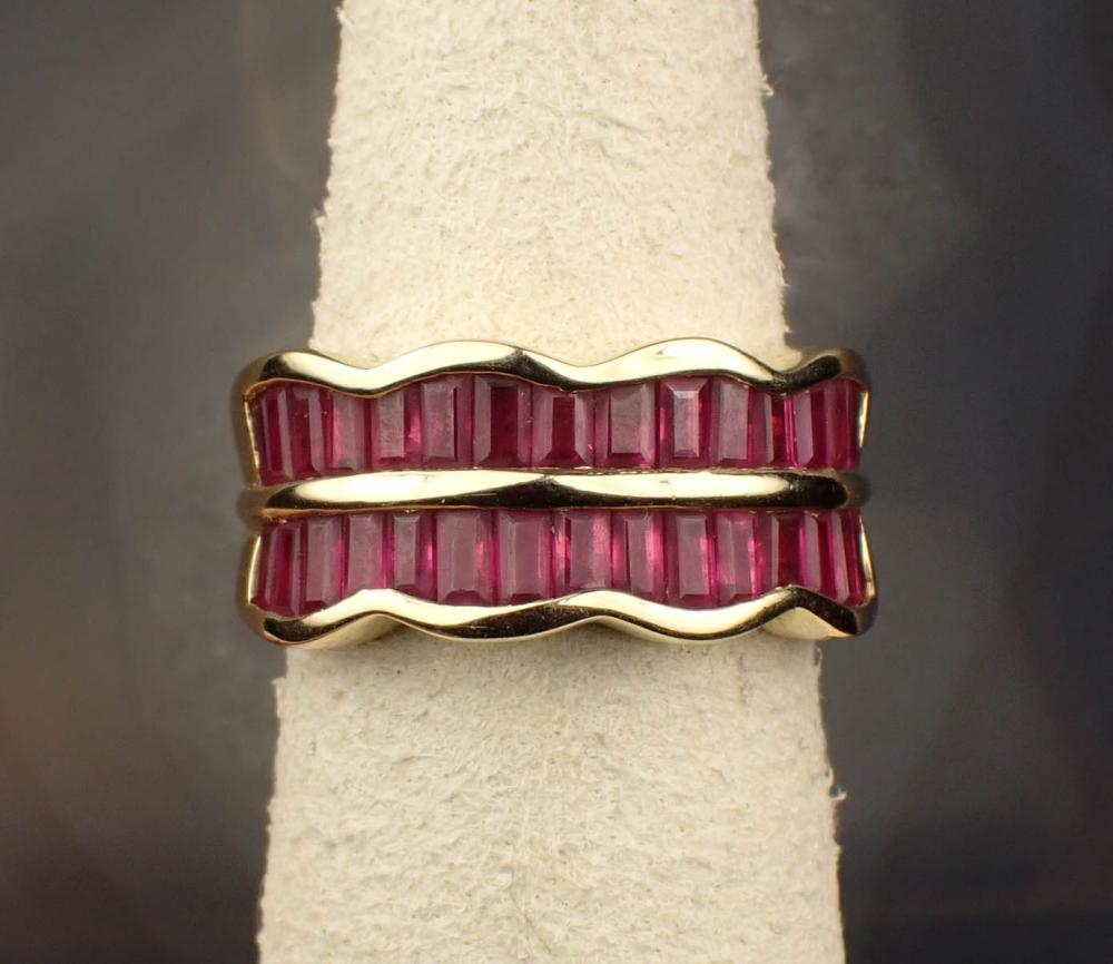 Appraisal: RUBY AND FOURTEEN KARAT GOLD RING The yellow gold ring