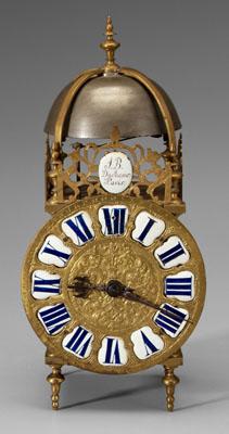 Appraisal: French brass lantern clock face with enameled numerals below oval