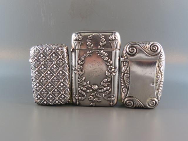 Appraisal: Sterling Silver Match Safes fleur-de-lis garland and more largest is