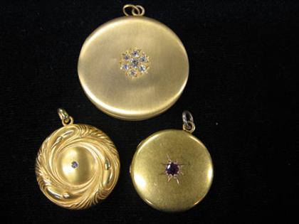 Appraisal: Three circular gold lockets etched with initials One with diamond