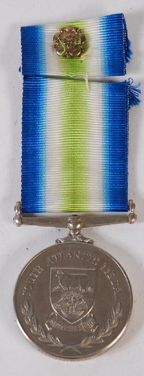 Appraisal: SOUTH ATLANTIC MEDAL ROYAL FLEET AUXILIARY WITH ROSETTE AND RIBBON