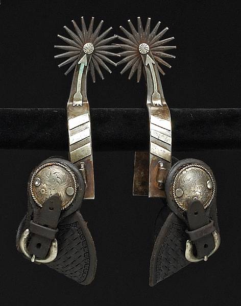 Appraisal: A pair of silver-mounted arrow shank spurs marked T S