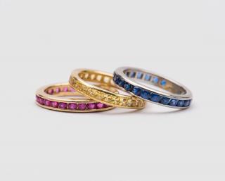 Appraisal: Three Gemset Eternity Bands THREE GEMSET ETERNITY BANDSincluding platinum and