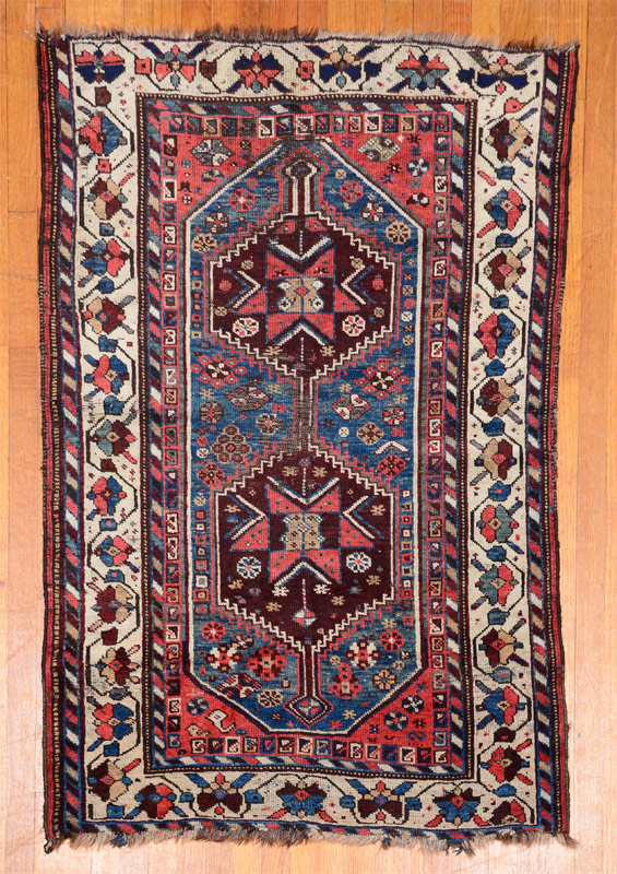 Appraisal: ANTIQUE CAUCASIAN HAND KNOTTED WOOL RUG ' '' x '