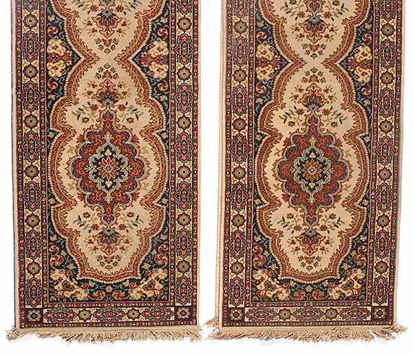 Appraisal: Pair of Persian-style Runners Pair of machine made Persian-style runners