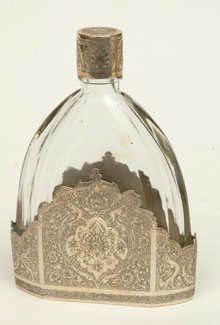 Appraisal: AN ISLAMIC SILVER MOUNTED CRYSTAL SCENT BOTTLE