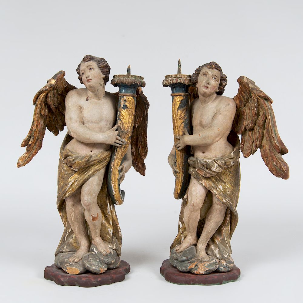 Appraisal: Pair of Italian Baroque Style Giltwood Angel Form Pricket Sticks