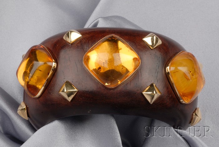 Appraisal: Exotic Wood and Amber Bangle Trianon the wide cuff with