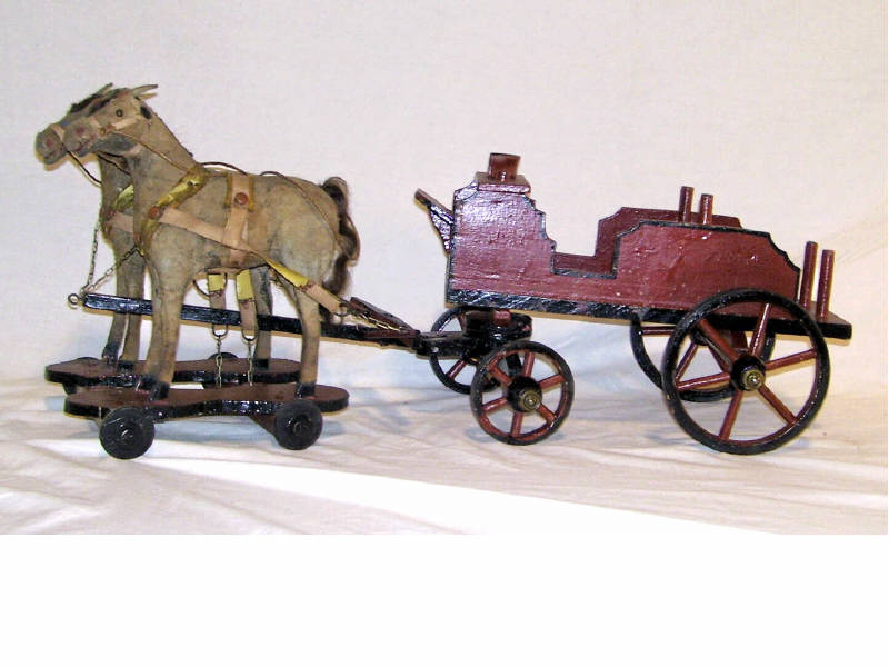 Appraisal: Late th Century Double Horse Drawn Wagon Cloth covered horses