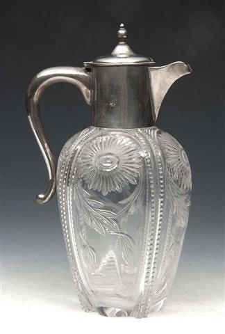 Appraisal: A CUT GLASS POSSIBLY STOURBRIDGE CLARET JUG with silver mounts