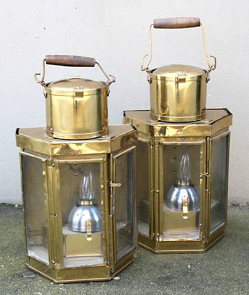 Appraisal: A pair of brass marine lanterns Each with three panel