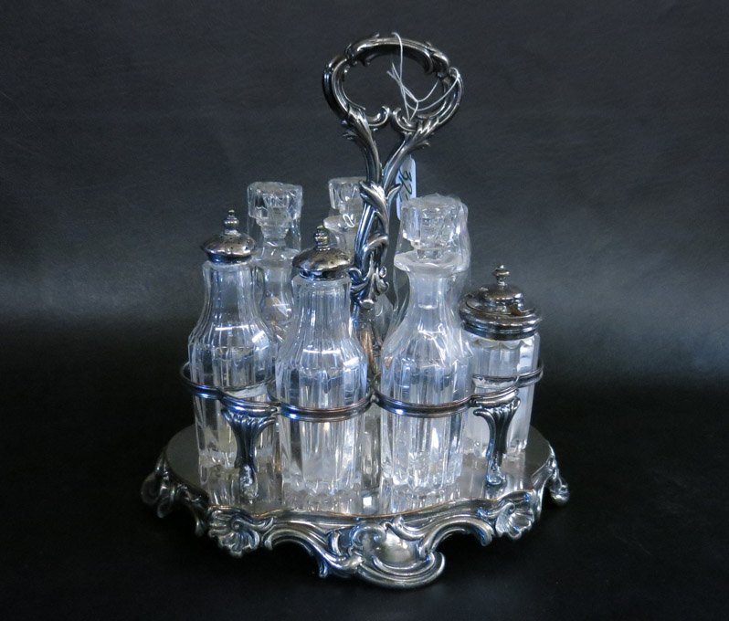 Appraisal: SILVER PLATED CASTOR SET having set of seven clear crystal