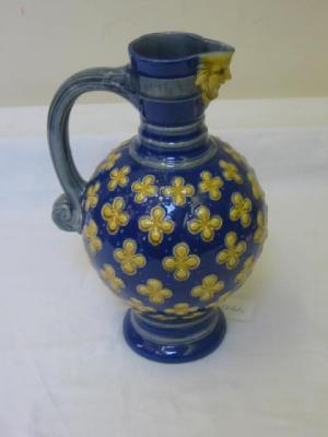 Appraisal: A MINTON MAJOLICA JUG of bellied form with moulded spout