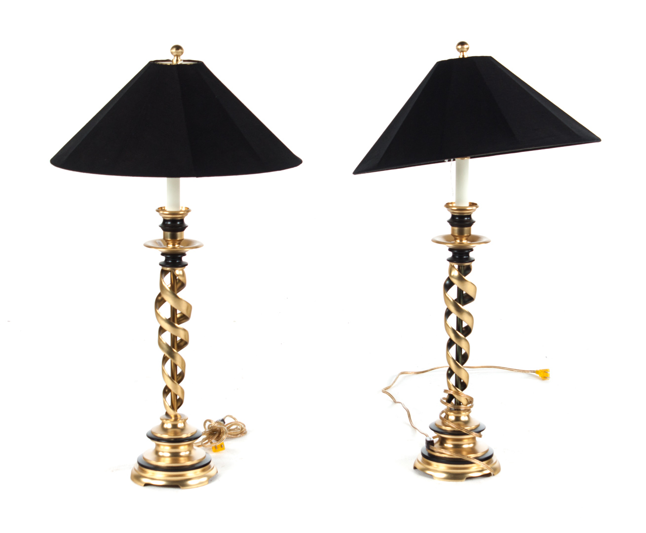 Appraisal: Pair of twisted brass candlestick style lamps with shades in