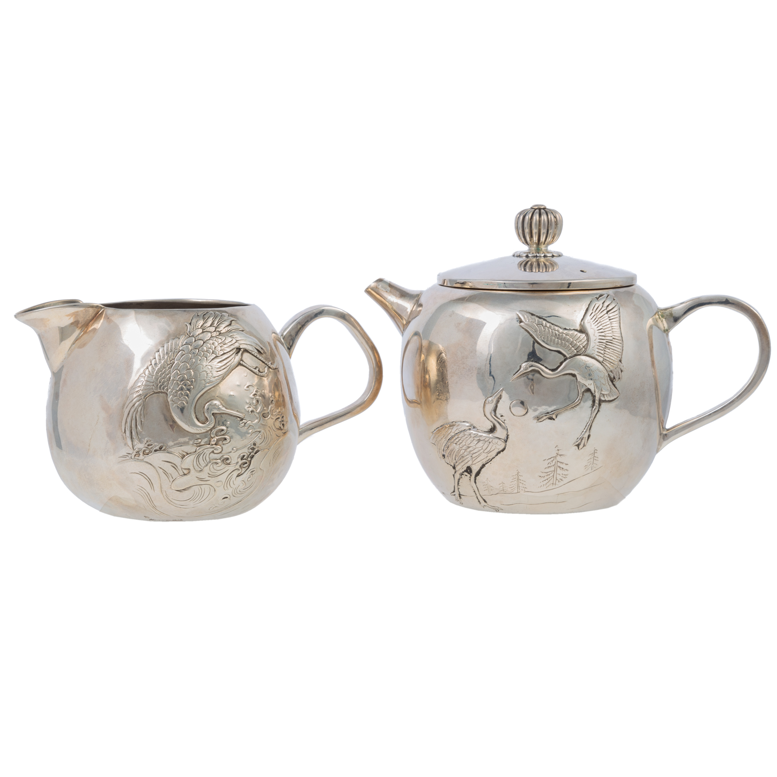 Appraisal: JAPANESE STERLING CREAMER SUGAR Each with applied crane decoration of