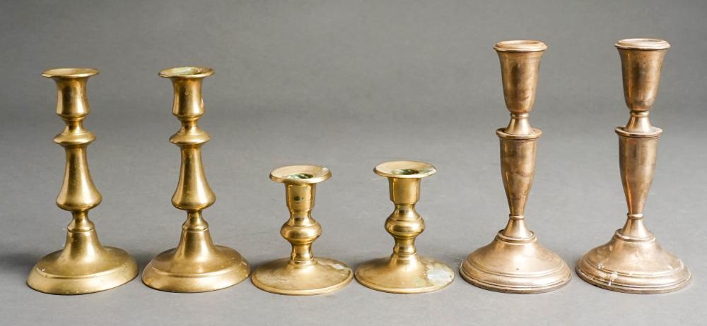 Appraisal: THREE ASSORTED PAIRS CANDLESTICKS BRASS AND WEIGHTED STERLING SILVER H