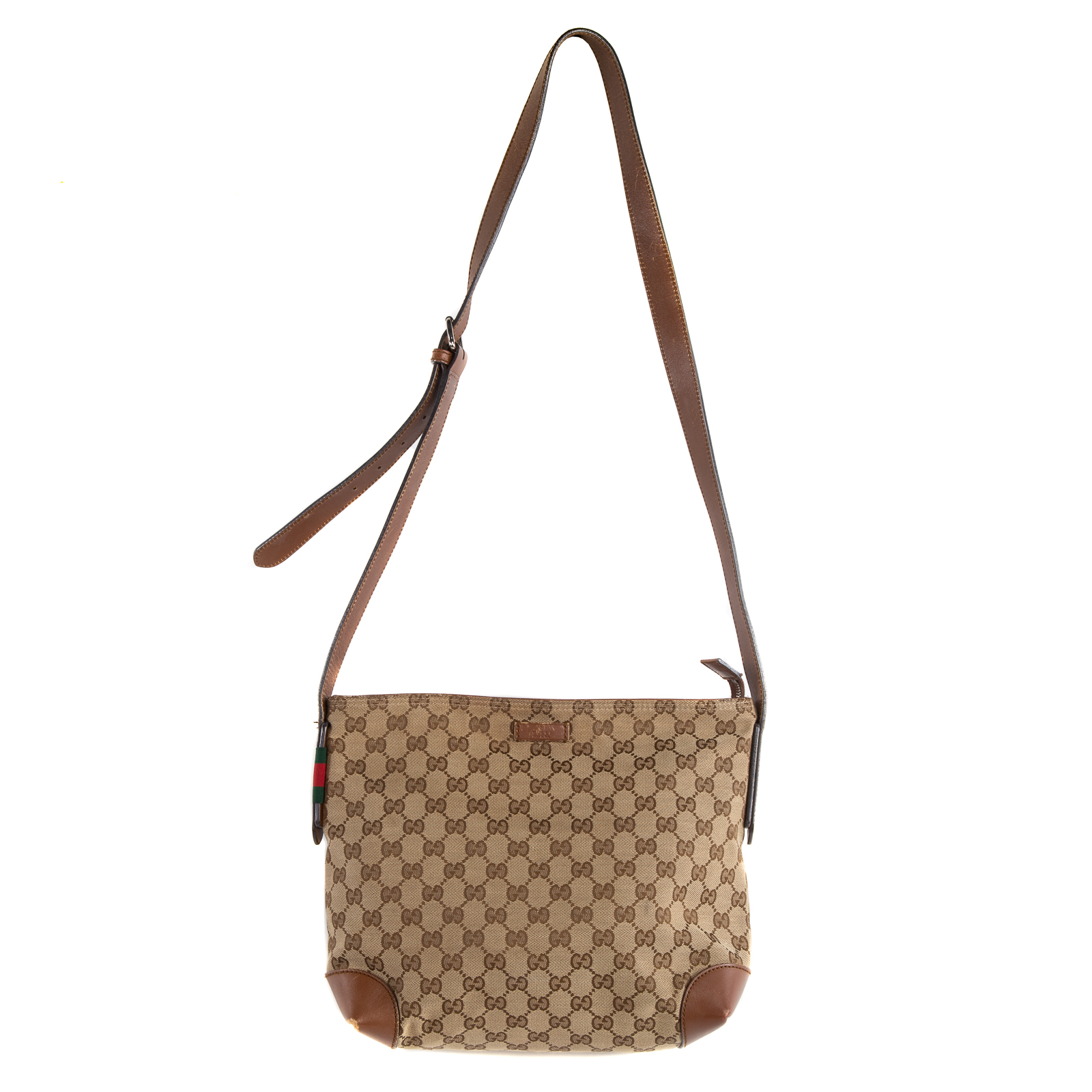 Appraisal: A GUCCI WEB CROSSBODY MESSENGER A brown and tan monogram