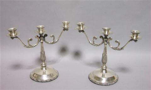 Appraisal: PAIR OF MEXICAN SILVER CANDELABRA Makers mark for I Vigueras